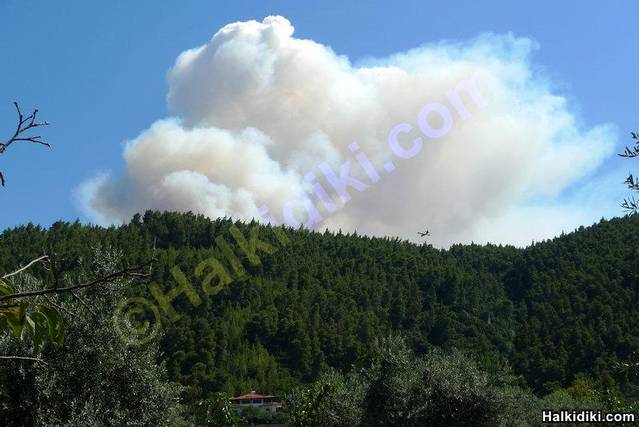 Small fire in Sithonia as seen from Sithonia (Vourvourou)